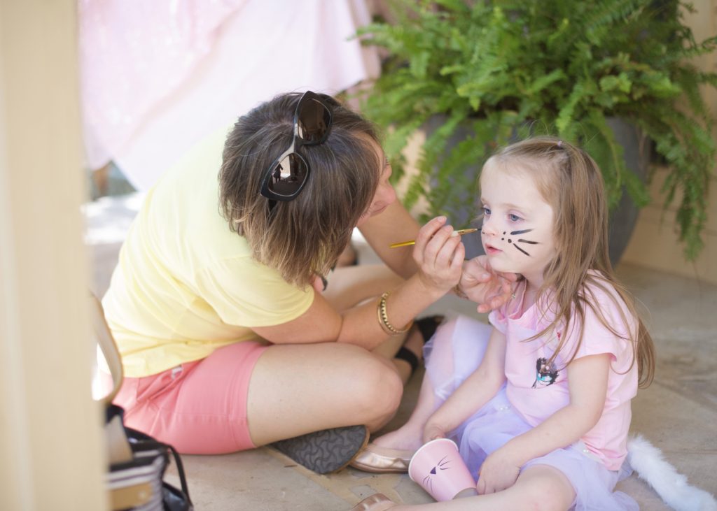 Face-painted noses and whiskers brought the kittens to life. | A Life More Beautiful