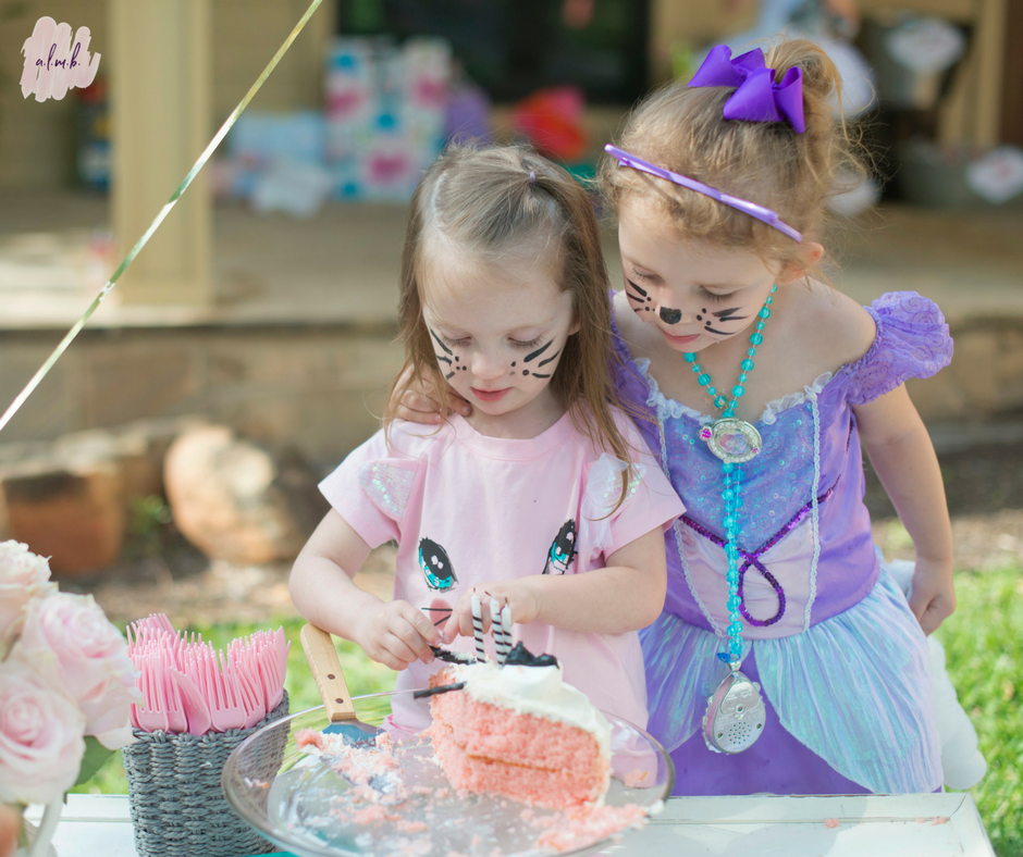 My daughter and her best friend decided to play hostess and serve the remaining cake on their own. | ALMB