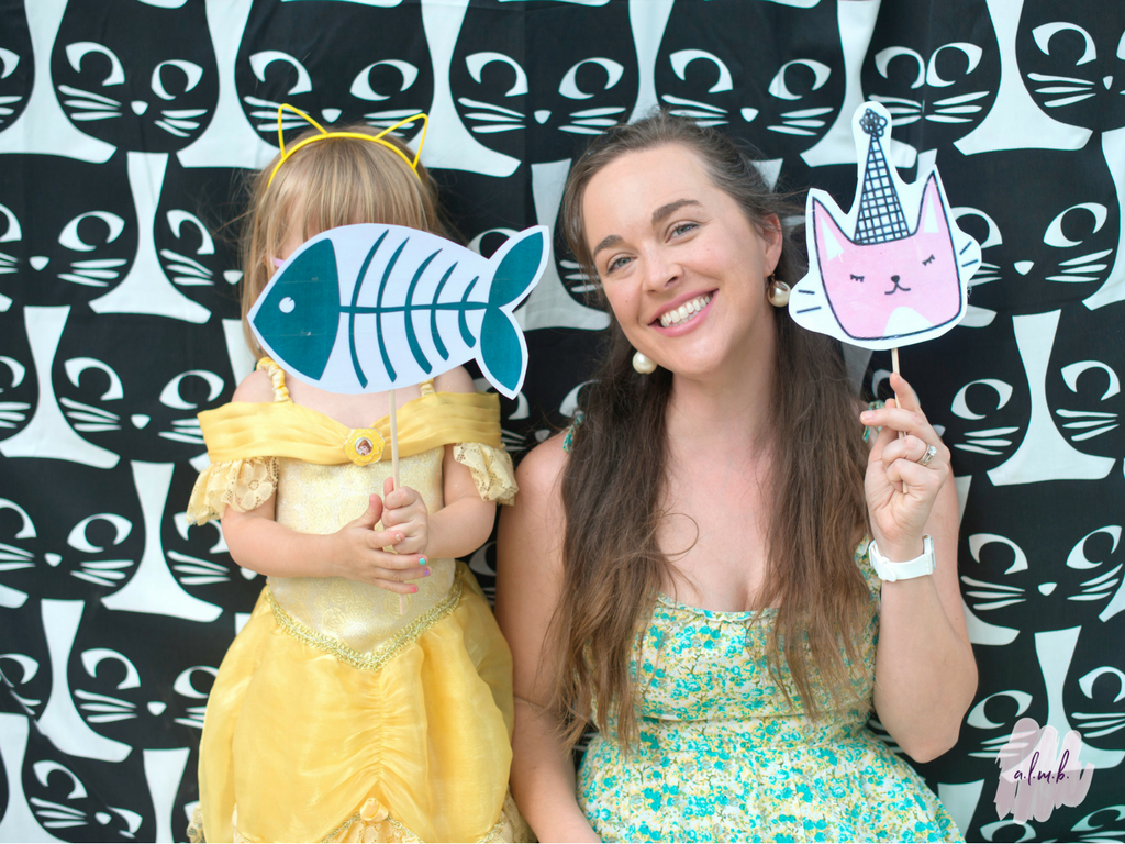 Parents and kids alike had fun posing in front of the photo booth. | A Life More Beautiful