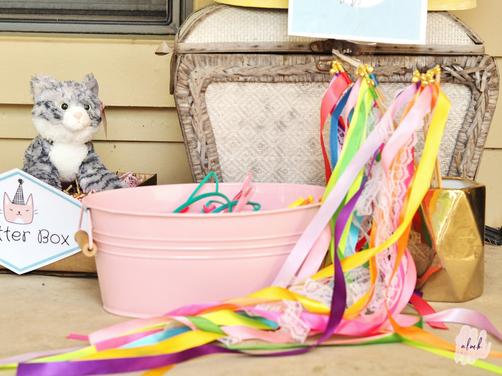 Plastic kitten ears and ribbon wands helped the children get in the pretty kitty spirit. | ALMB