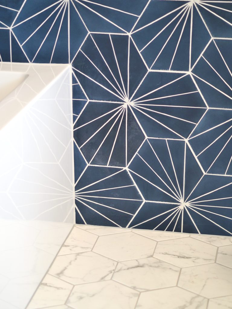 Bold blue tile adds energy to the master bathroom by A Life More Beautiful