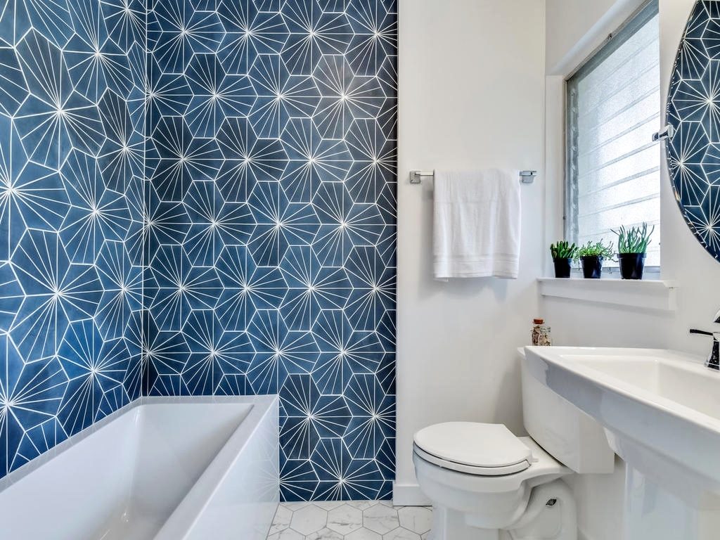 Bold, geometric tile is hot in Austin home interiors this year. Design by A Life More Beautiful